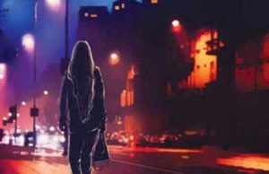 Young Girl waiting for the car near the company gate at midnight