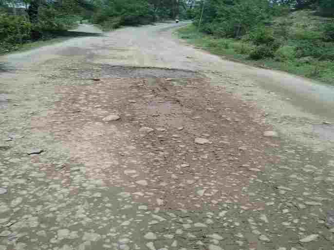 potholes on the road from Akole to Virgaon Fata