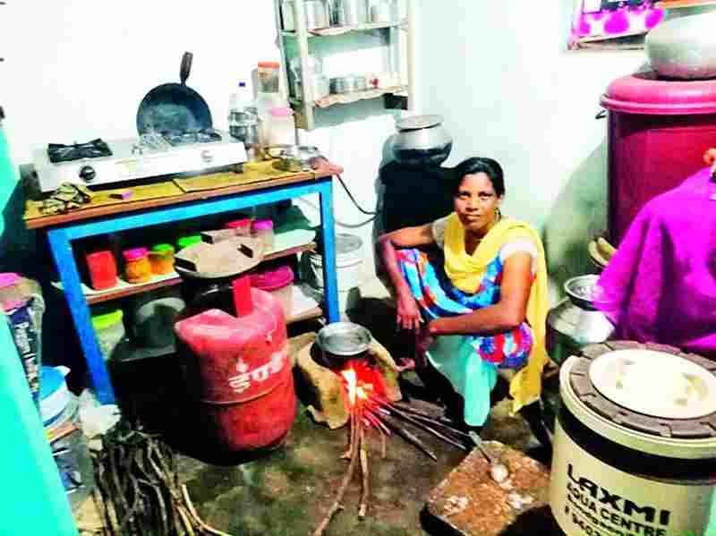 Ujwala Gas Connection `Beneficiary cooking on the stove again