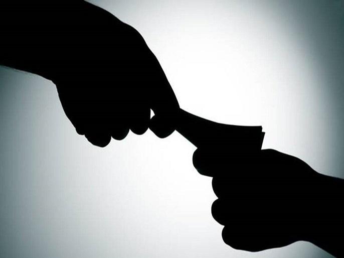 Two private agents arrested for taking bribe