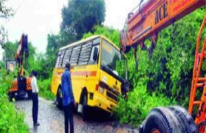 School bus in pit Twenty students survived