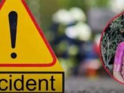 Woman dies in container-bike accident