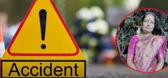 Woman dies in container-bike accident